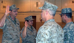 (L-R) SCPO Westberry, PO1 Lee, being sworn into the TMAR by CDR Cave, BGen BodischPhoto by WO1 George Monnat TMAR TXSG TMF